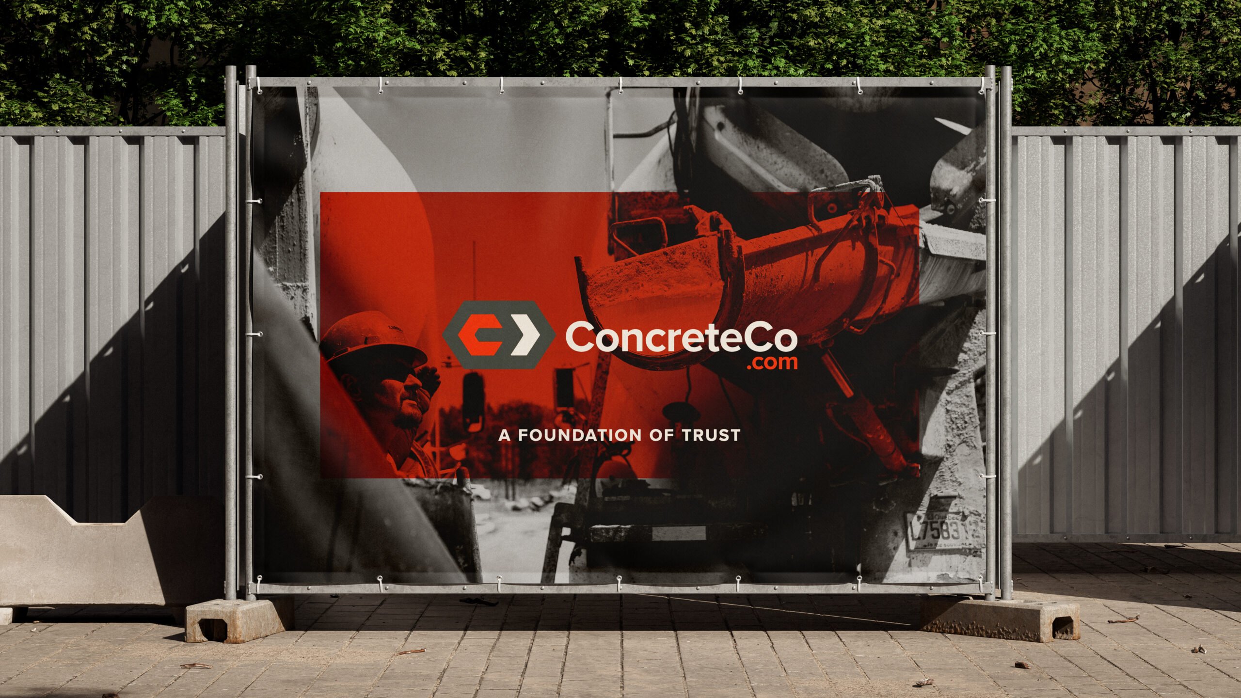 Photo of a fence with the ConcreteCo.com logo